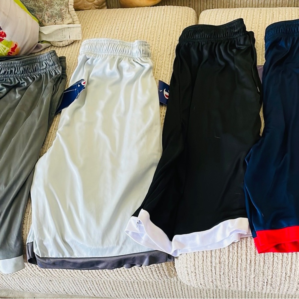 Brand new Champion gym shorts, set of four, large